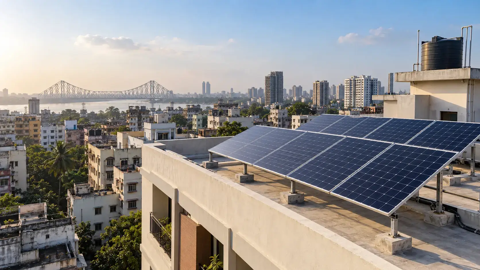 A residential rooftop solar array overlooking the city and a river bridge